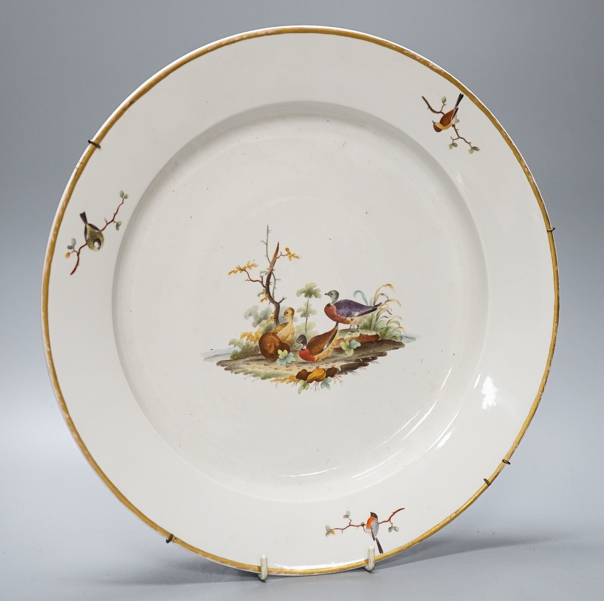 An 18th century Furstenberg bird painted porcelain dish 34cm